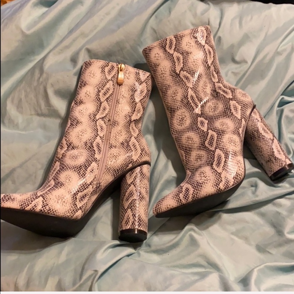 Fabric snakeskin boots as Kylie a Jenner wore